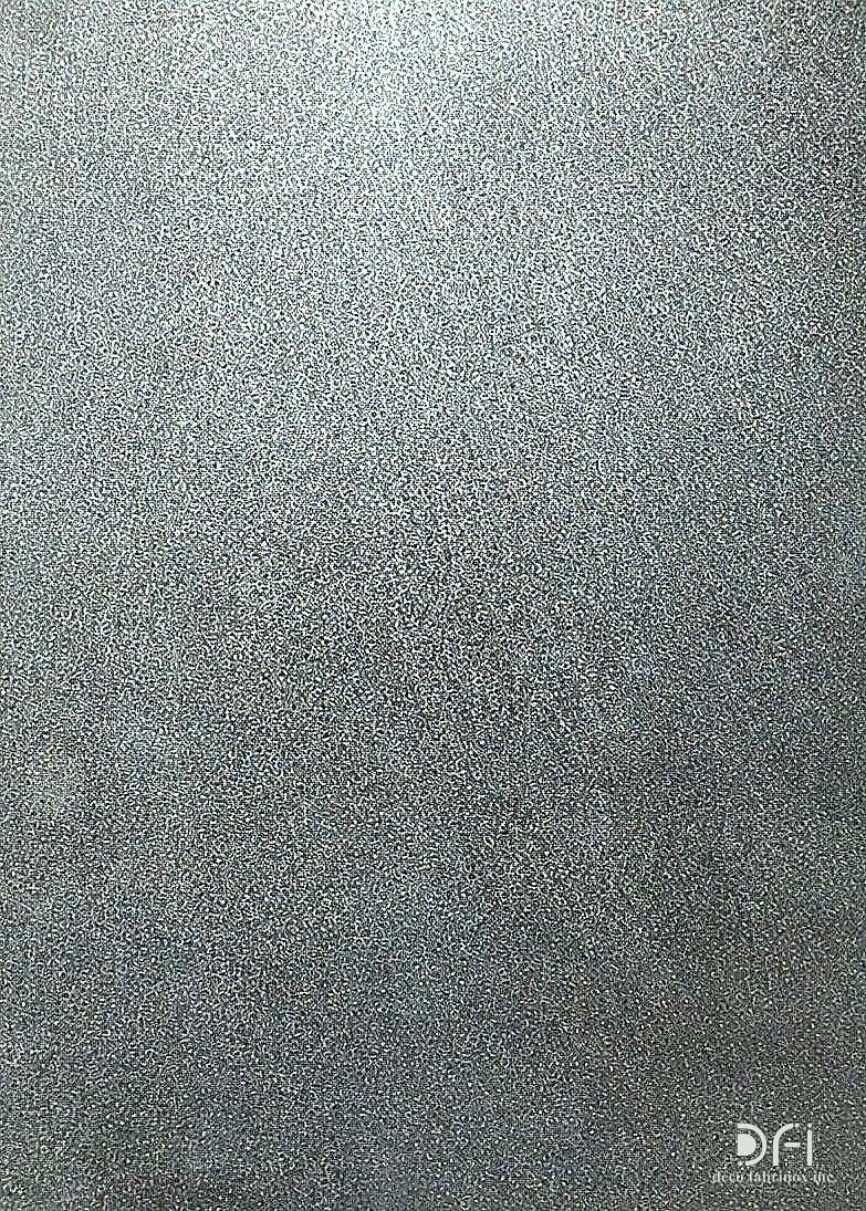 Close-up of a galvanised iron sheet, its zinc coating catching the light
