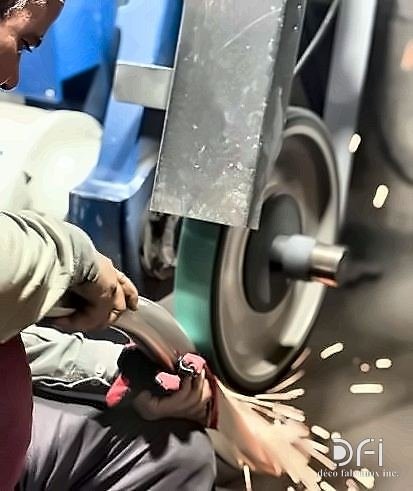 Sparks from grinding during metal finishing