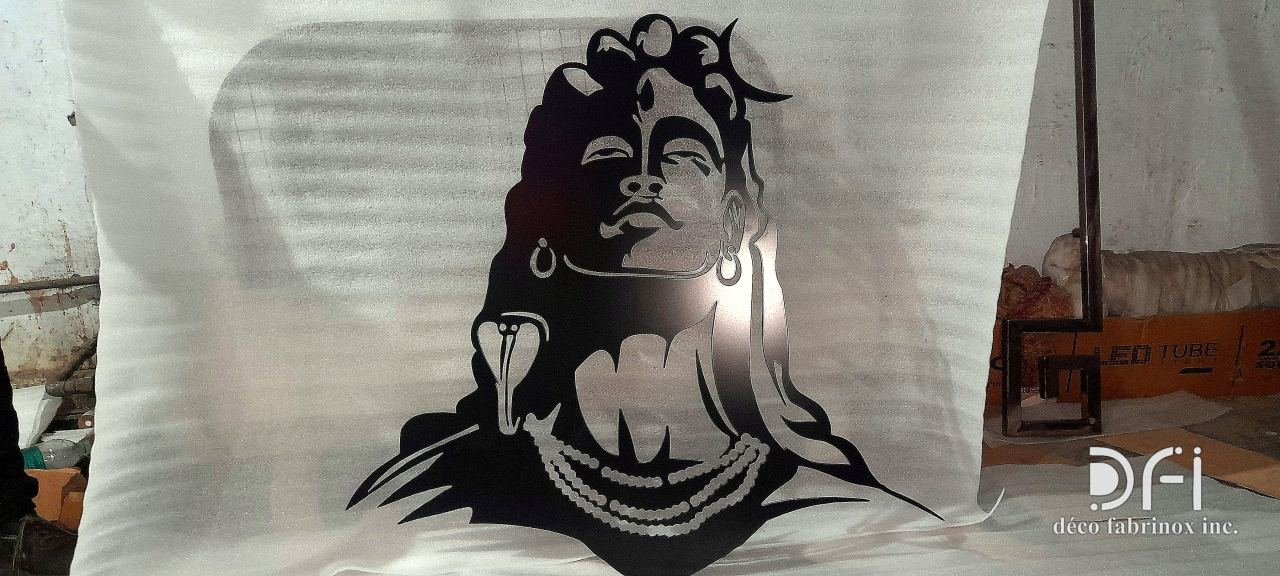 Laser-cut black metal portrait of Adiyogi Shiva