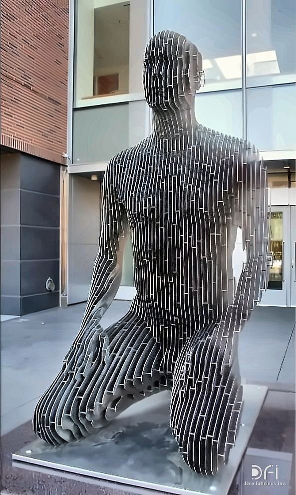 Laser-cut steel figurative sculpture in a courtyard