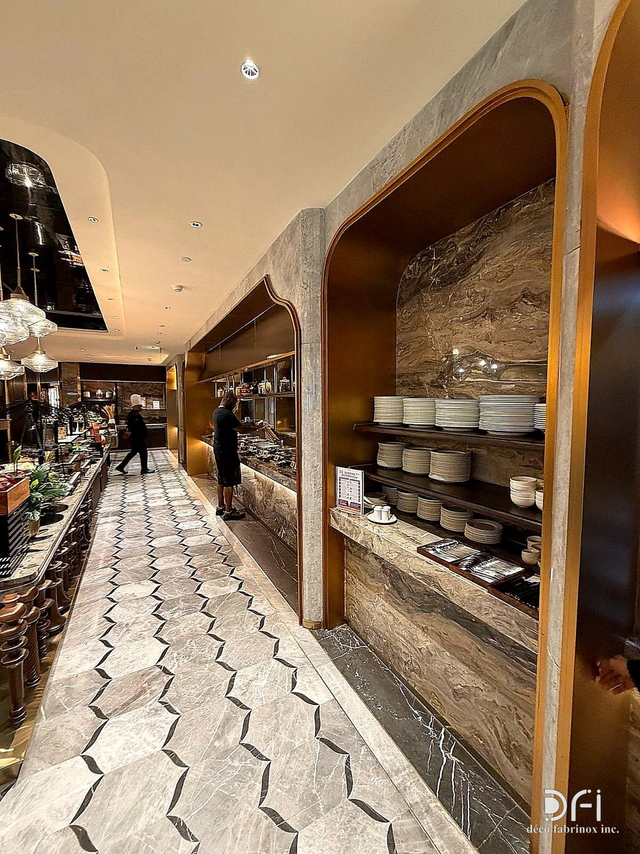 Long buffet line under brass-edged arches in an airport lounge