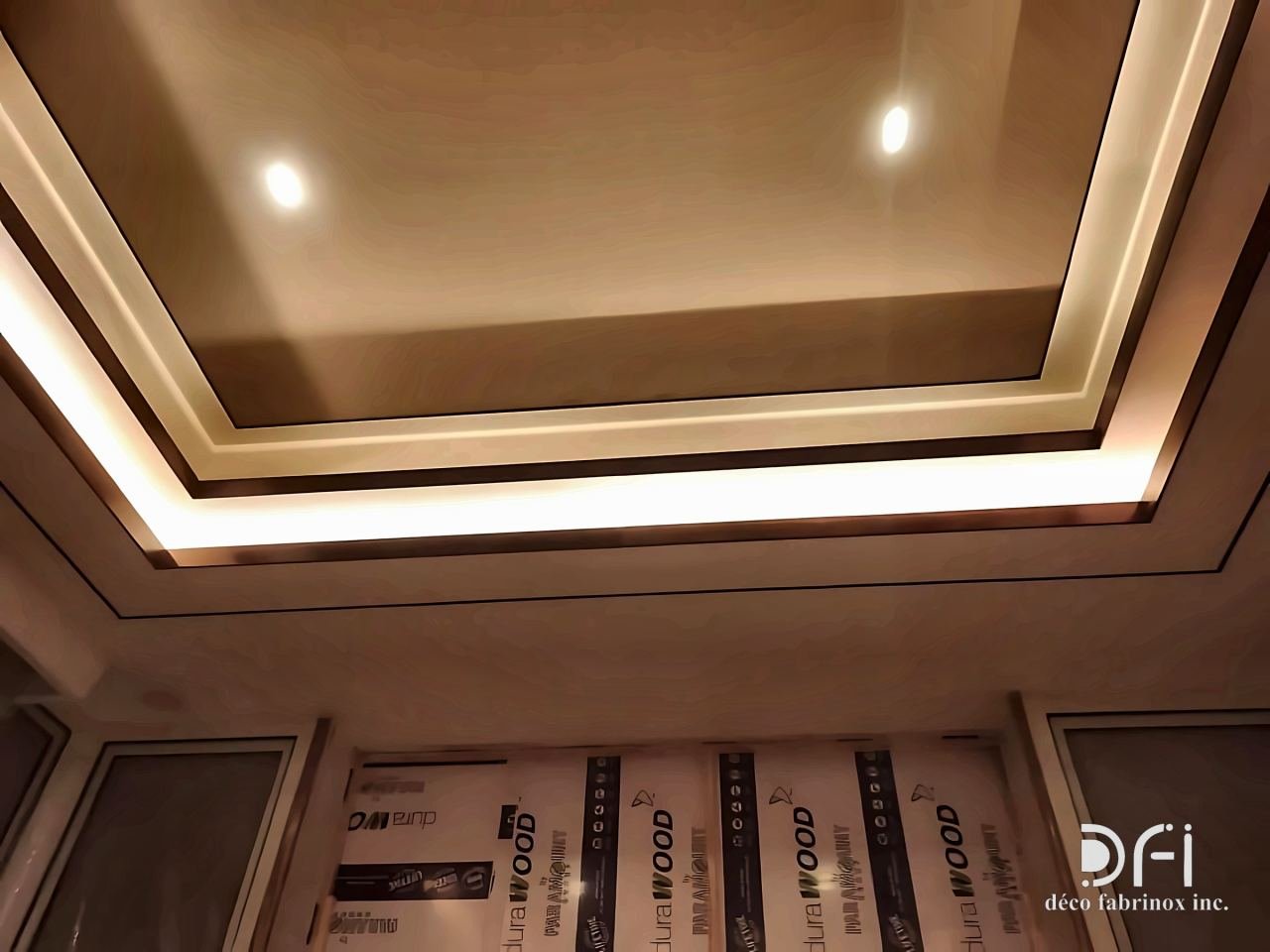 Bronze-edged tray ceiling with cove lighting
