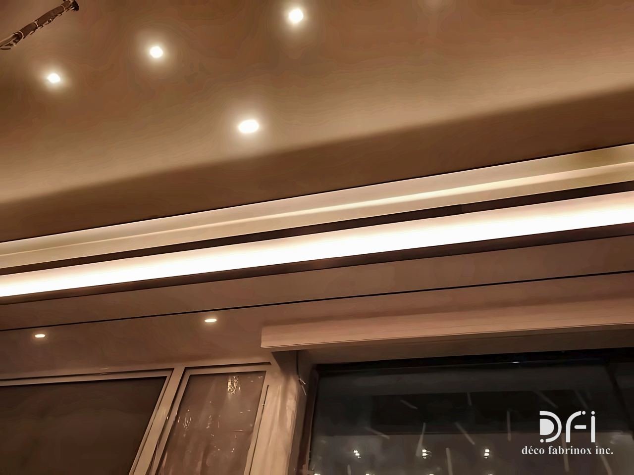 Bronze ceiling trims with cove lighting