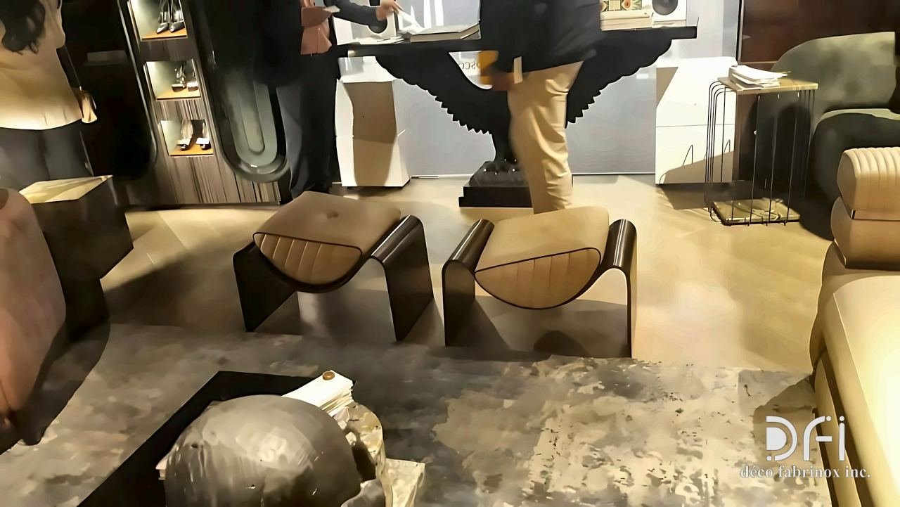 Bronze-framed lounge stools in a showroom