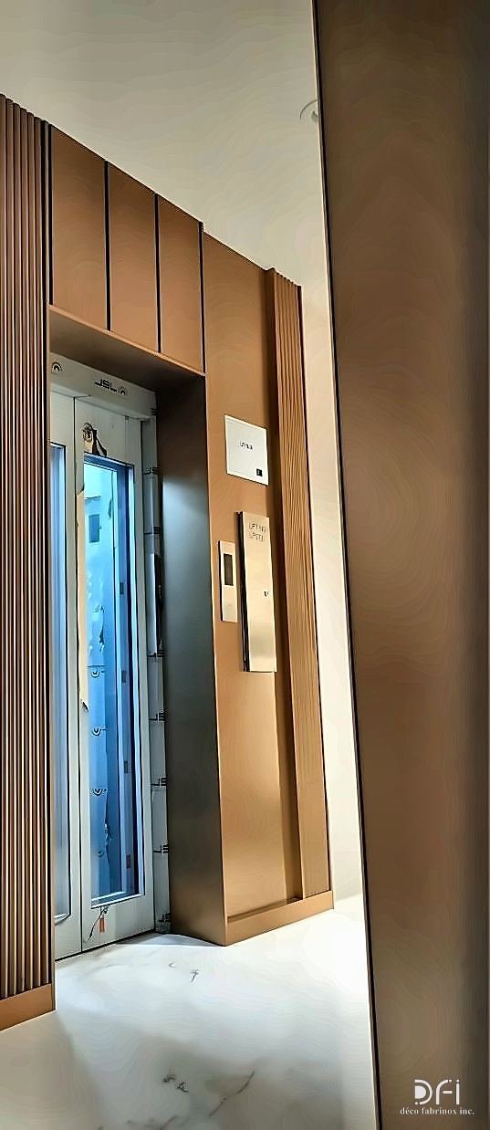 Metal-clad lift doors and lobby surround