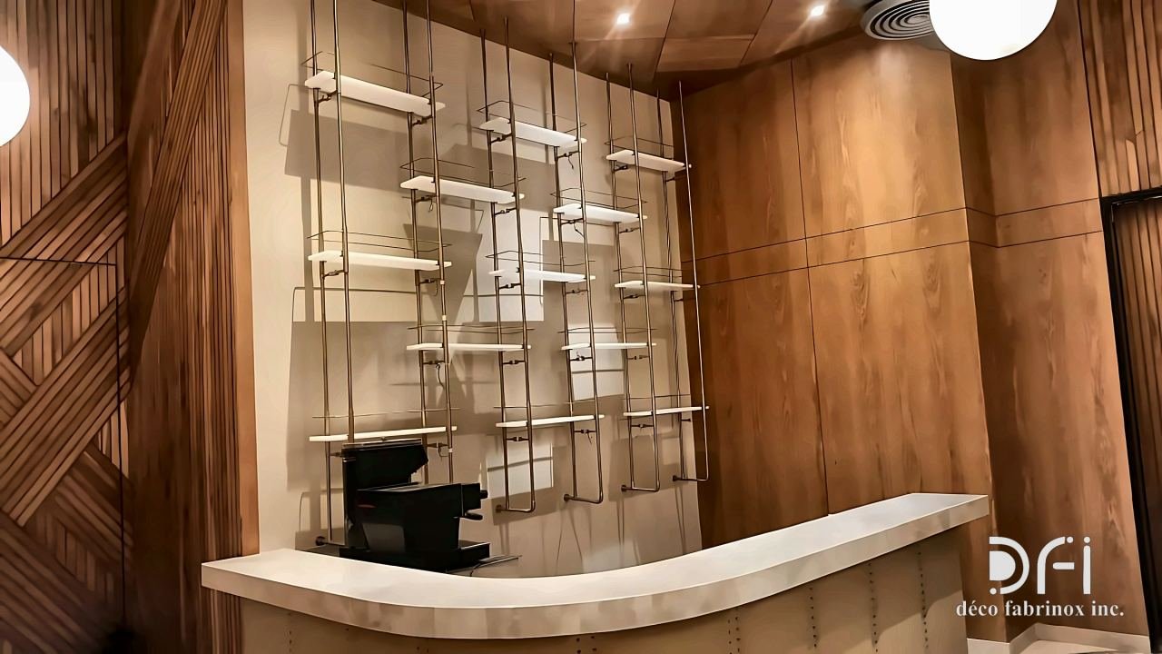 Metal shelving grid behind a curved reception counter