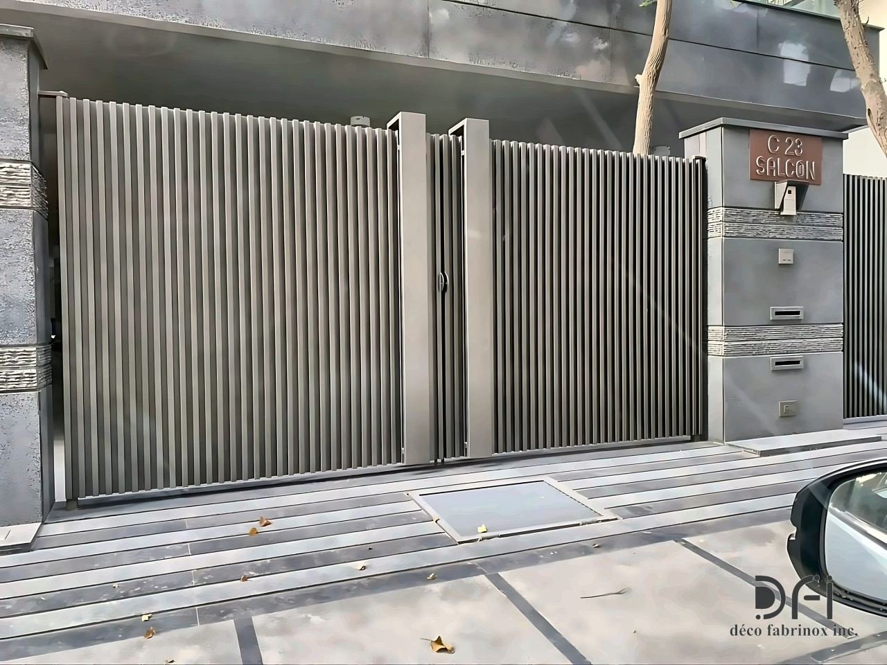Vertical-slat metal gates and boundary wall