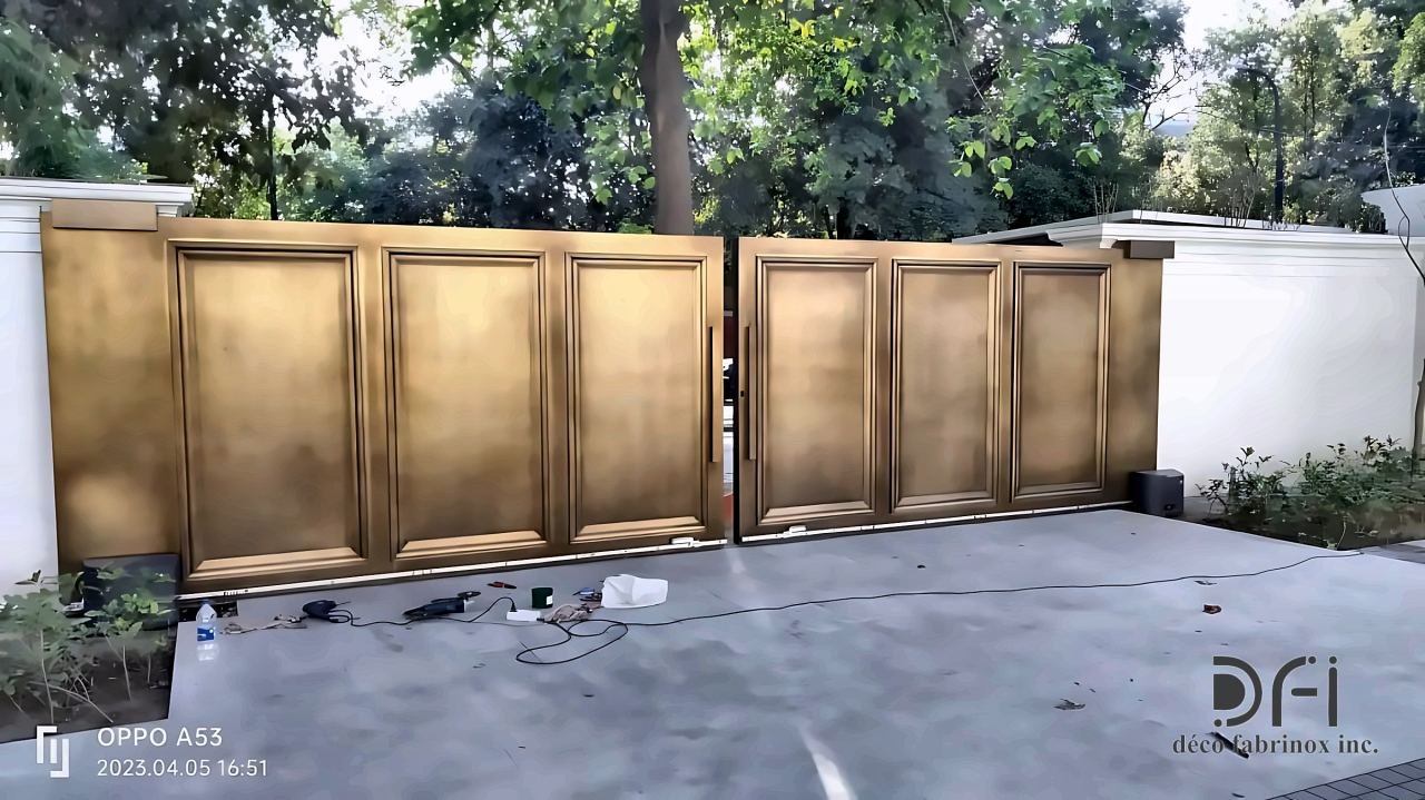 Antique brass panelled sliding gate