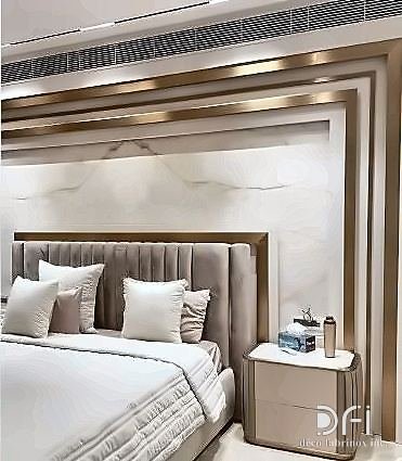 Metal headboard wall panelling in a hotel bedroom