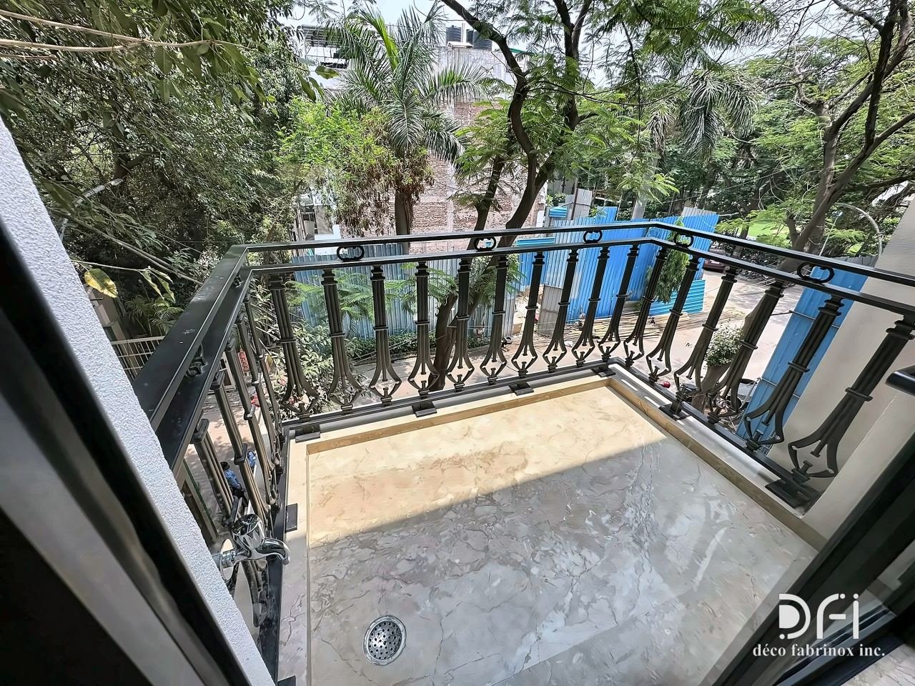 Black ornamental railing on a terrace balcony