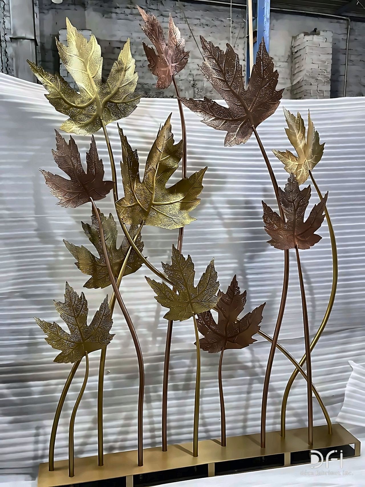Brass and copper maple-leaf sculpture on stems