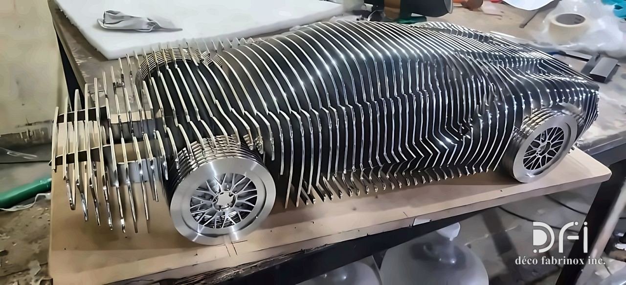 Car sculpture built from stacked steel profiles