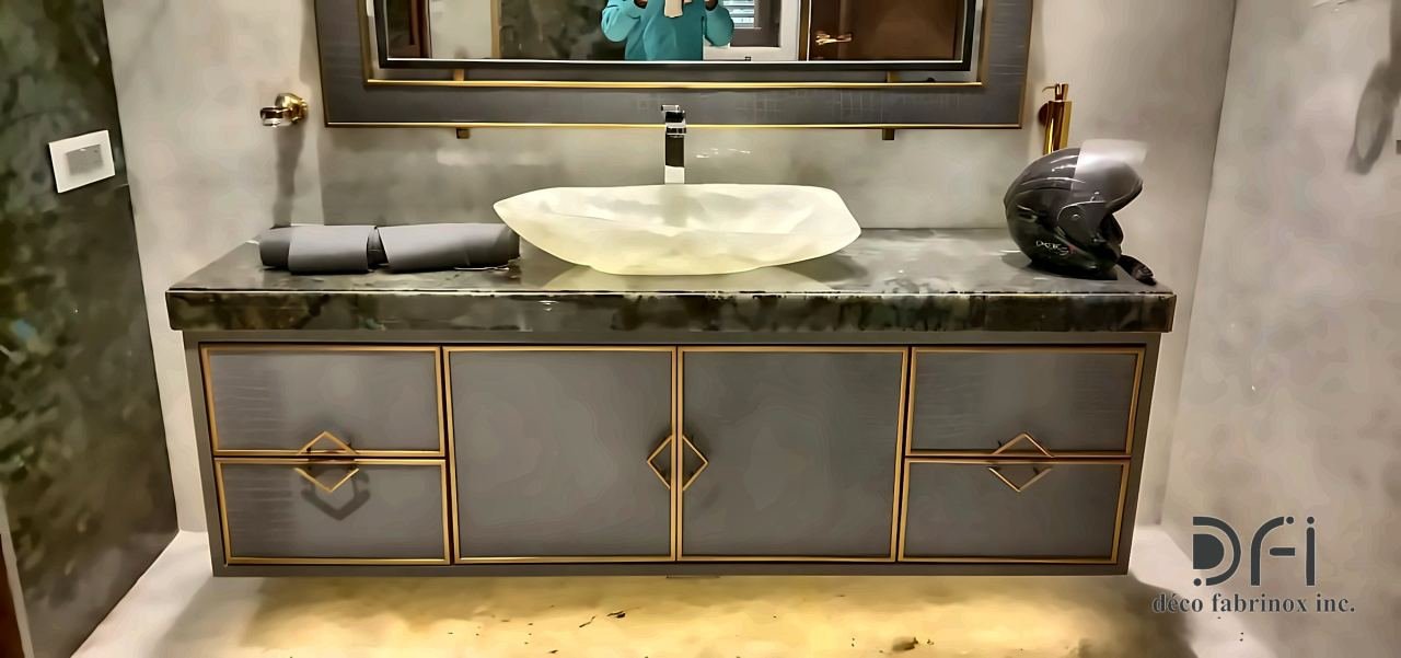 Vanity unit with brass-trimmed grey doors and diamond inlays