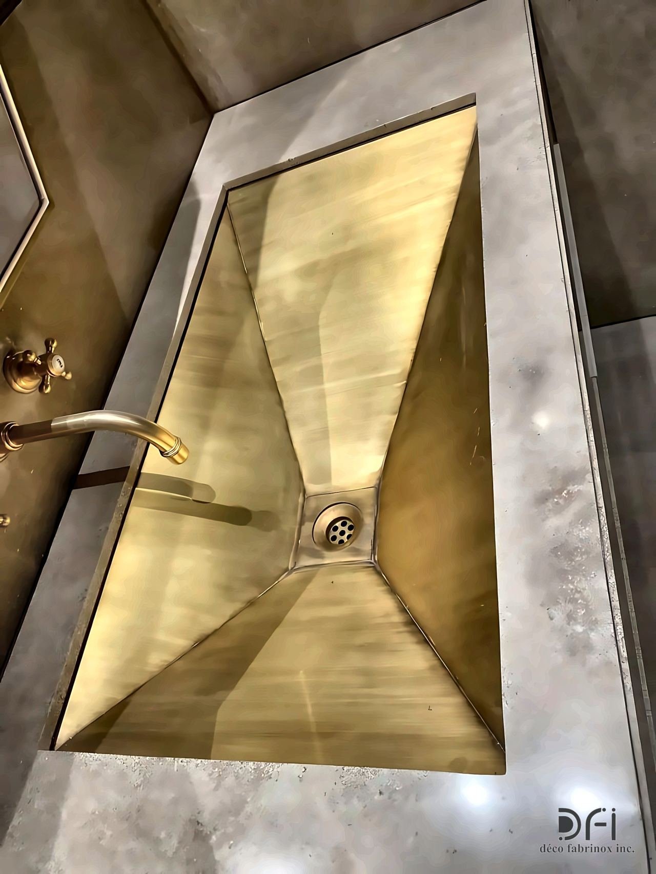 Brass sink basin with faceted folded sides