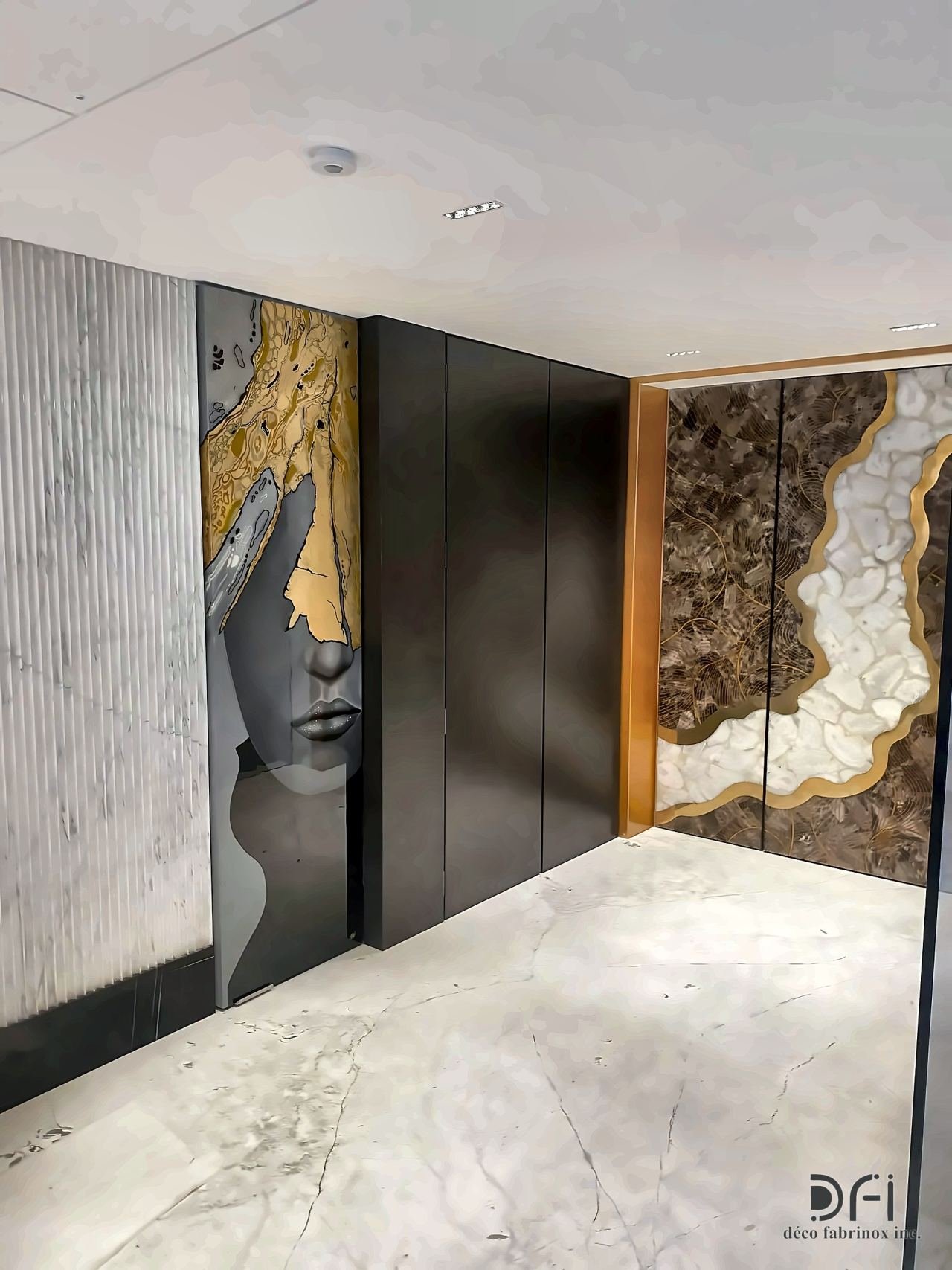 Black metal wall panels between art panels in a lobby