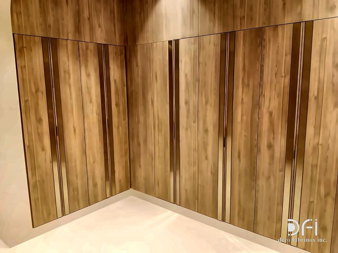 Wood-grain metal wall panels with bronze inlay strips