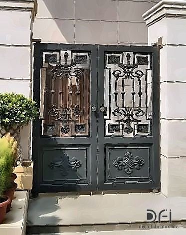 Decorative wrought metal double gate